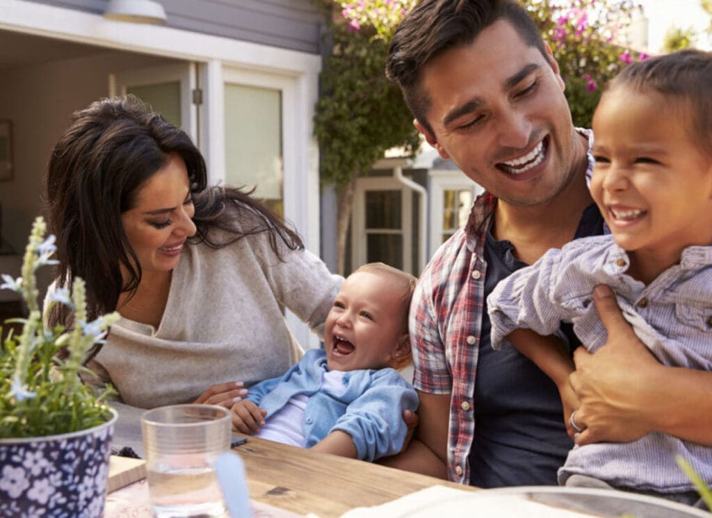 Custom-Landing-Page-Happy-Family-Eating-Outside-Their-Home-After-a-Fire