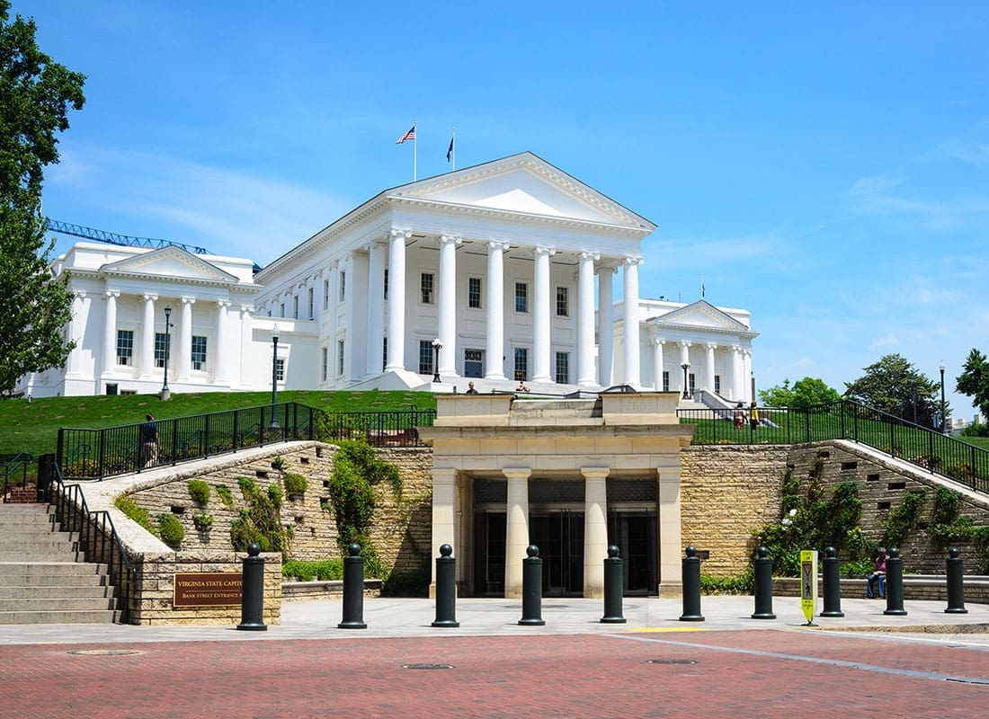 Read Our Reviews - View of the White Capitol Building Against a Bright Blue Sky in Historic Richmond Virginia