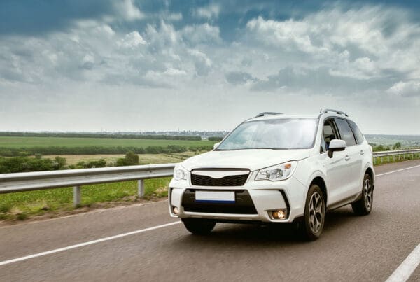 Full Service York PA - Modern Car Driving on Road Daytime