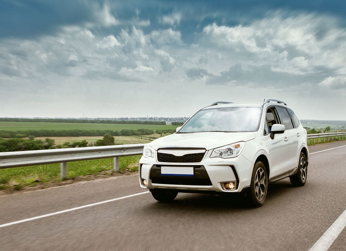 Full Service York PA - Modern Car Driving on Road Daytime